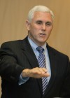 Dems' Gregg smiles while shredding Pence in campaign ads
