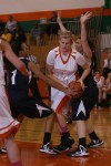 Wheeler's Nickole Finch is defended by Bishop Noll's Asya Hobbs, left, and Elena Sobilo