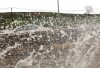 Flooded roads, swollen rivers, lightning strikes as storms sock region