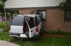 At least one injured after car crashes into brick Gary home