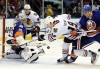 Sharp scores twice, including OT winner for Hawks