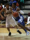 Hamilton Southeastern's Zak Irvin tries to get past Bowman Academy's Linden Jackson on Friday.