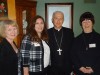 Bishop blesses new foster mother, honors volunteers