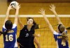 Carmel's Carly Skjodt blocks a spike by Lake Central's Brooke Renner on Saturday.
