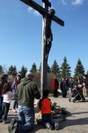 Father Rocky leads Good Friday service in St. John