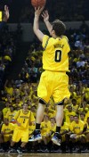 Novak, Michigan stun No. 15 Connecticut