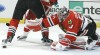 Crawford helps Hawks top Red Wings