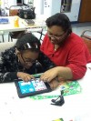 Students use iPads to learn and communicate