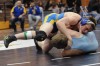Eric Johnson of Highland attempts to roll opponent Brandon Bisping