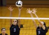 Lake Central's Brooke Renner and Kim Kayes go up for a block