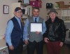 Southeast Lions honors store manager for his support of club