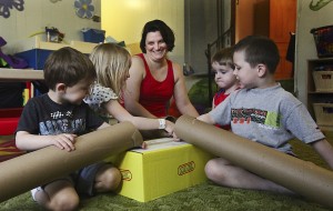 Ill. woman graduates from college while running day care