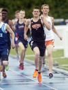 Beecher's Griffin Nzkaza heads to the finish line