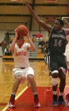 Munster's Drew Hackett shoots over Hammond's Michael Kirkendall