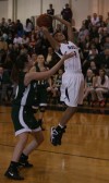 Bishop Noll's Asya Hobbs shoots against Whiting's Alex Danielides