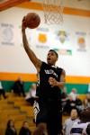 Griffith's Anthony Murphy drives for a layup
