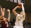 VU's Ryan Broekhoff shoots over Loyola's Joe Crisman, a Munster grad,