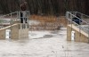 Flooded roads, swollen rivers, lightning strikes as storms sock region