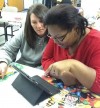 Students use iPads to learn and communicate