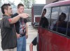 Lowell Body Shop owner Dave Hirata helps Lowell students