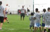 Pierre Thomas coaches a drill