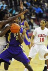 T.F. North's Jamal Redmond tries to move around