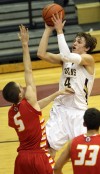 Chesterton's Matt Holba shoots over Andrean's Daniel Keilman