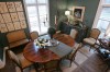 Warmth and worldly flair define a vast riverside estate