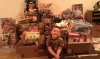 Santa's little helper gets early start gathering toys for Christmas 