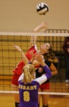 Crown Point's Courtney Kvachkoff spikes against Hobart's Caylie Puritt