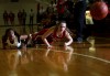 E.C. Central's Dariyelle Ricks and Munster's Jordan Cole, right, dive for a loose ball