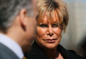 Weinberger brought to court for deposition