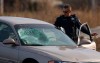 Man marking underground utilities struck by car  