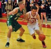 Portage's Michael Lattanzi tries to drive the baseline on Valparaiso's John Mosser