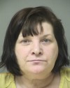Woman charged in animal hoarding case