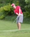Portage's Nick Lewis chips onto the green on No. 2 at Forest Park during Friday's Valparaiso Sectional.
