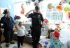 Griffith firefighters, police salute boy recovering from kidney transplant