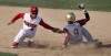 Morton second baseman Devonte Robinson tags out a sliding David Cox of Andrean