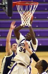 T.F. North junior Sylvester Tolliver shoots around the defense