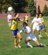 Highland's Katherine Smailis heads the ball 