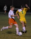 Morgan Twp.'s Ryan Reynolds and Wheeler's Steven Crosby