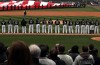 The National Anthem is played