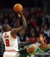 Bulls rally late without Rose to bump off Boston