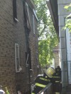 Woman rescued from burning Hammond home