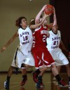 E.C. Central's Alicia Jackson defends against Munster's Jordan Cole on Wednesday.