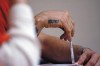 County officials revamp jail booking fee  