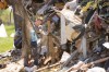 Overturned trash hauler snarls U.S. 30 traffic