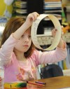 Kids talk turkey during pre-Thanksgiving Day activities in Hobart, Cedar Lake