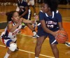 West Side's Antoinette Taylor guards E.C. Central's Mariah Lewis