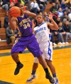 T.F. North's Sylvester Tolliver tries to save a loose bal